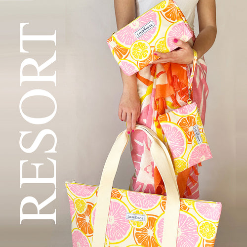Resort Collection image of Slice of Sun print on  the boat bag, wristlet, makeup bag, and wrap