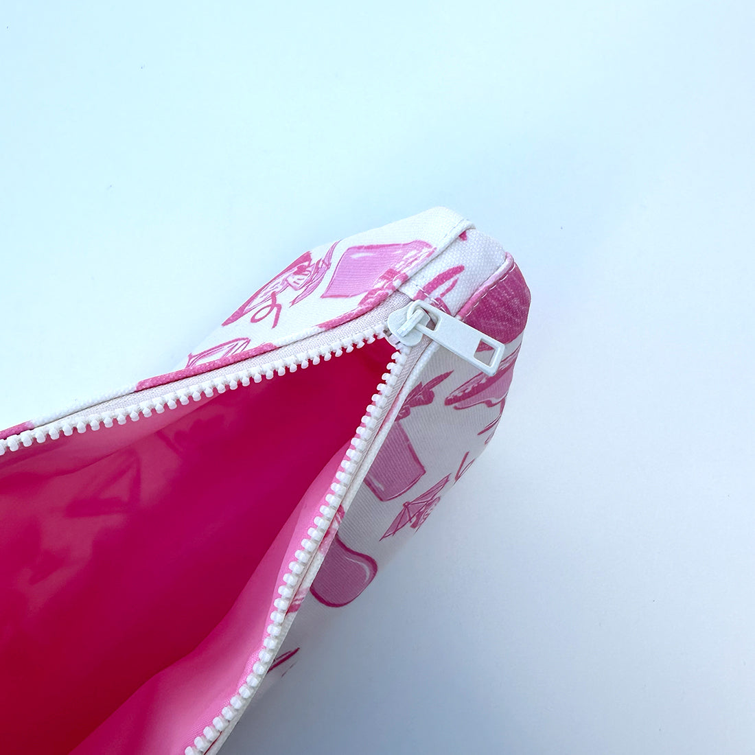 pink lining interior of makeup bag